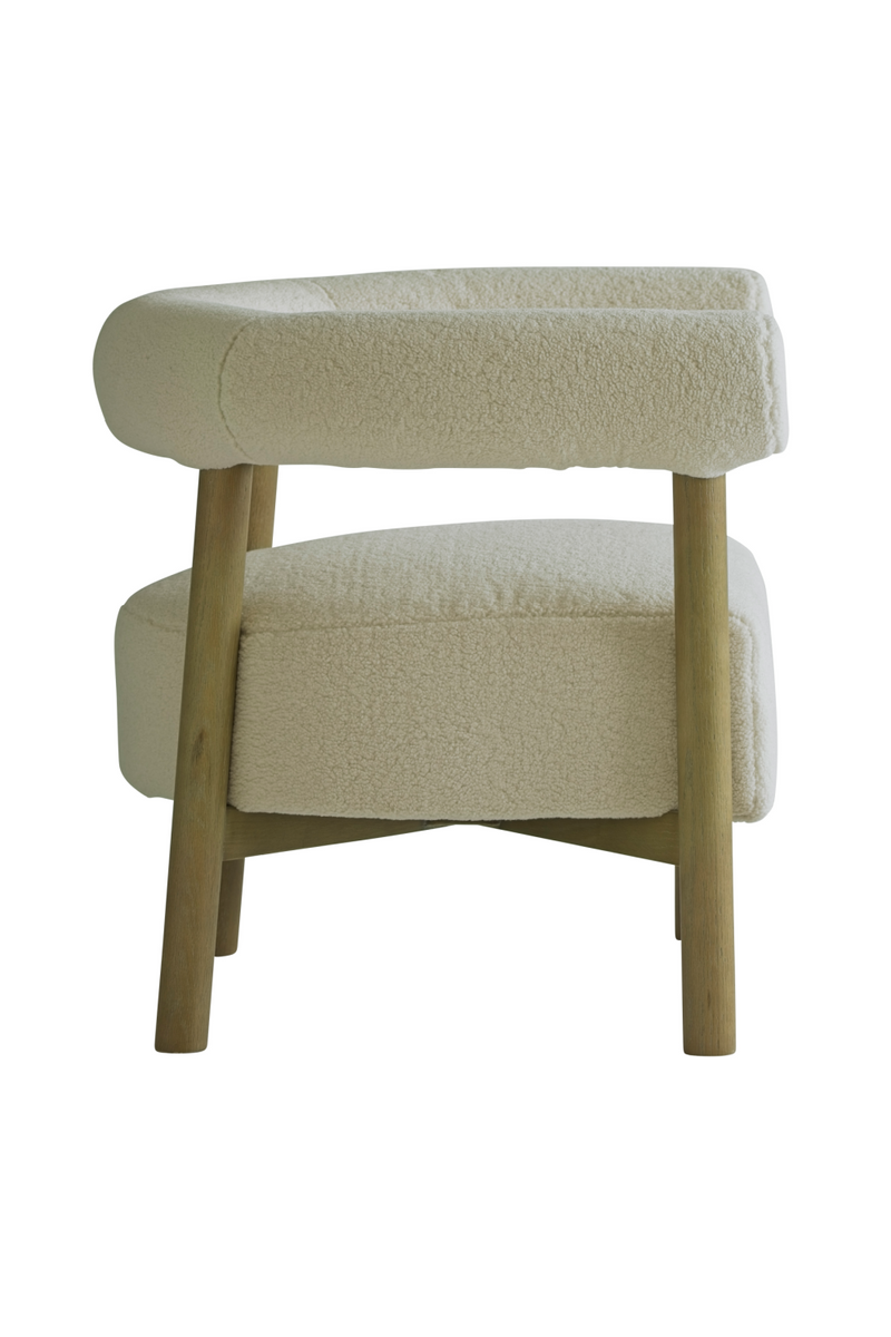 Cream Sheepskin Curved Armchair | Andrew Martin Rollo | Woodfurniture.com