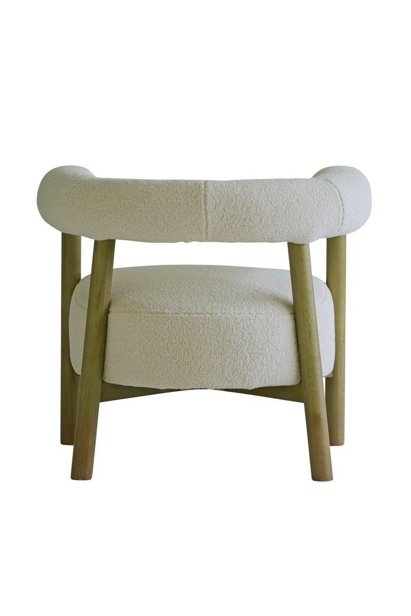 Cream Sheepskin Curved Armchair | Andrew Martin Rollo | Woodfurniture.com